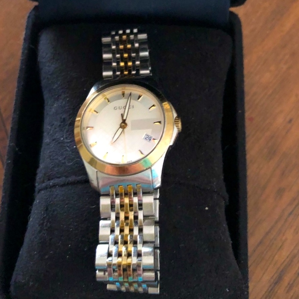 Gucci ladies watch gold and silver